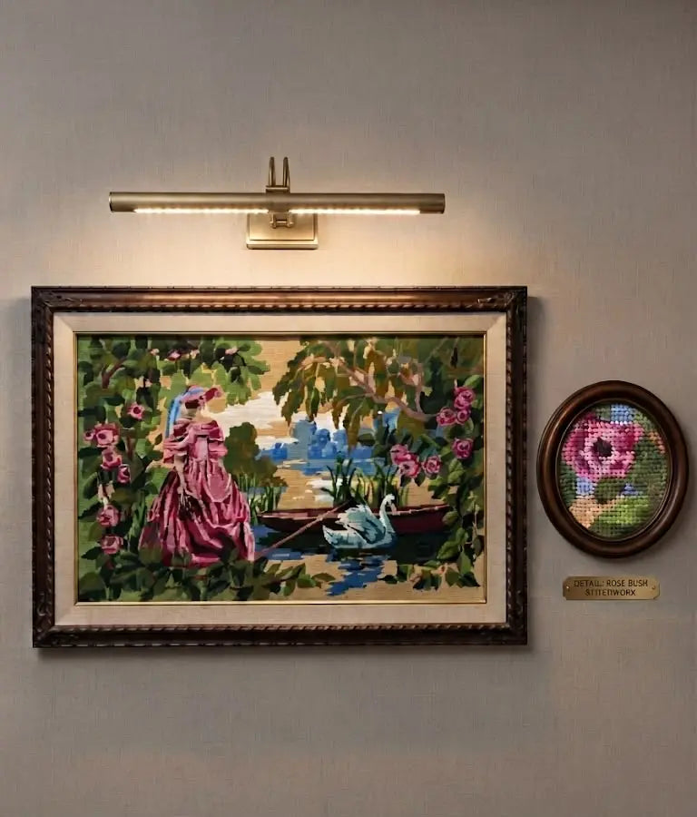 A magnificent, highly detailed vintage needlepoint tapestry depicting a picturesque garden scene with an elegant lady in a pink gown by the water's edge, 35” W x 25” H